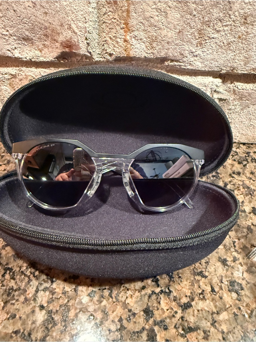 Oakley Men's Sunglasses Clear Frame with Black Lenses